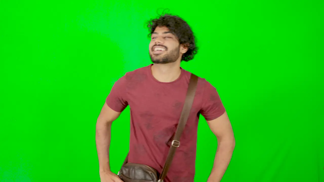 Indian guy wink to people and public with green screen and green background