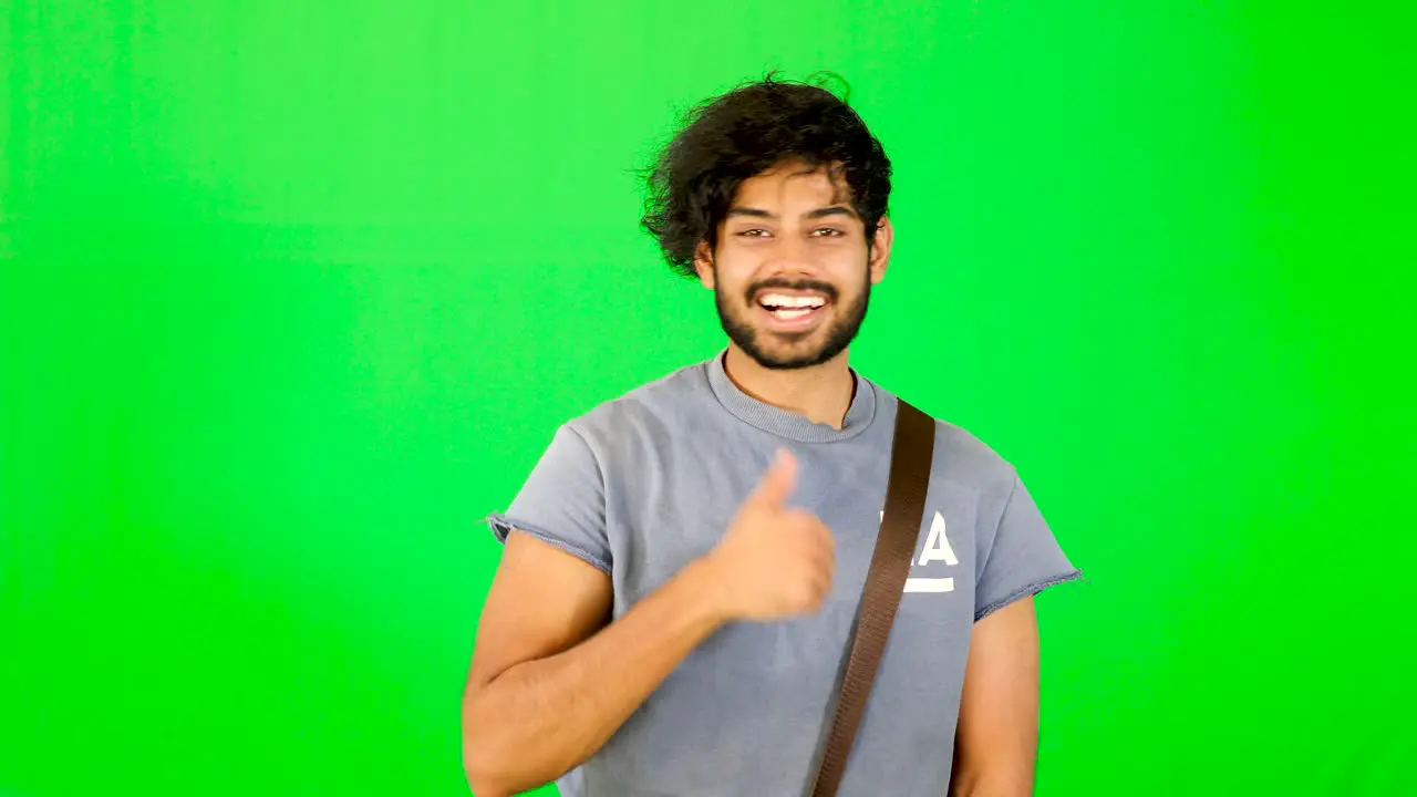 indian tourist point out good place with green screen with green background