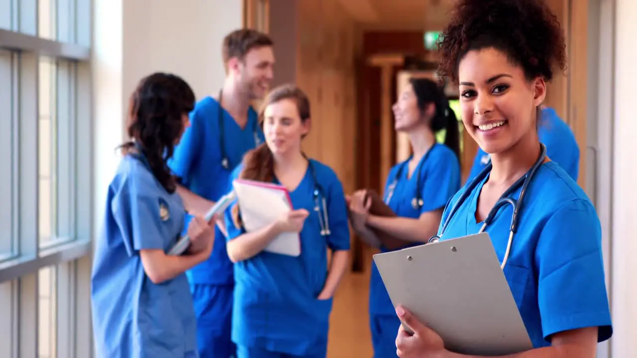 Medical students chatting in hallway