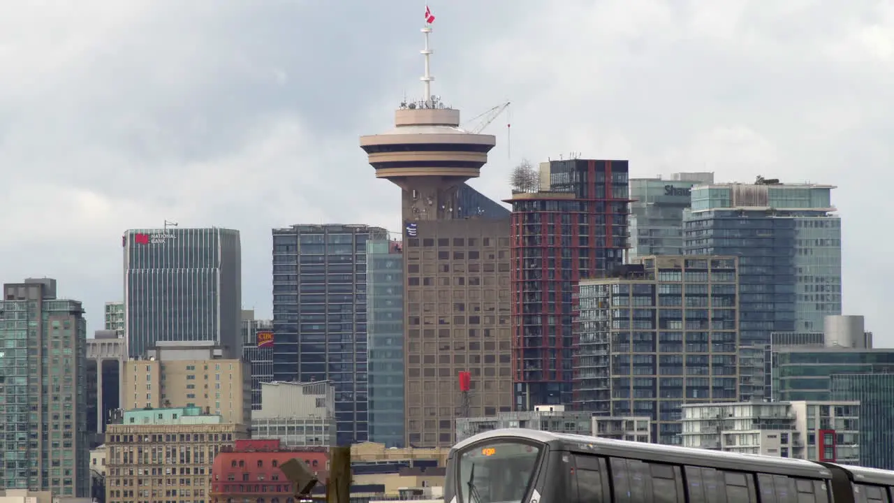 Vancouvers central business district skyline Skytrain passing Static