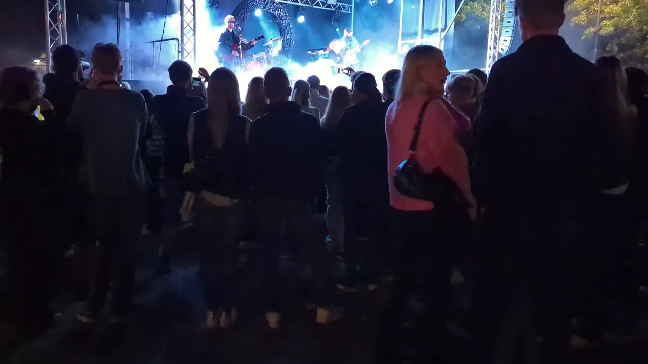 4K 60FPS Couple in Love are Watching a Free Outdoor Concert in Sweden Tilt Shot