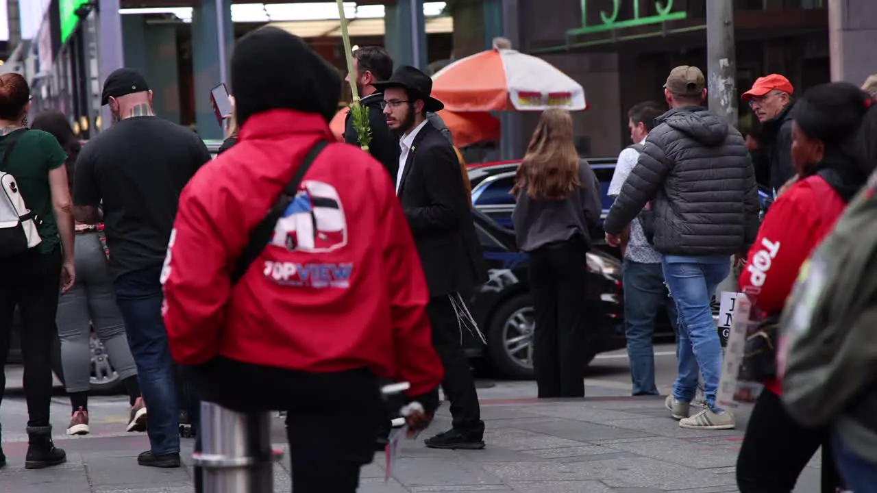 Hasidic Preacher In Times Square Pacing Up And Down Amongst Crowds