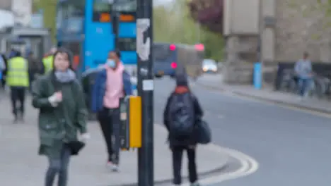 Defocused Shot of Pedestrians In Street