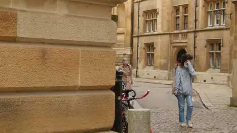 Tracking Shot of Pedestrians On Quiet English Street 