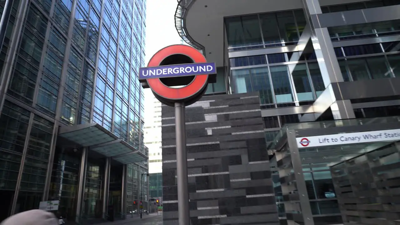 POV walking through Canary Wharf London in streets with people