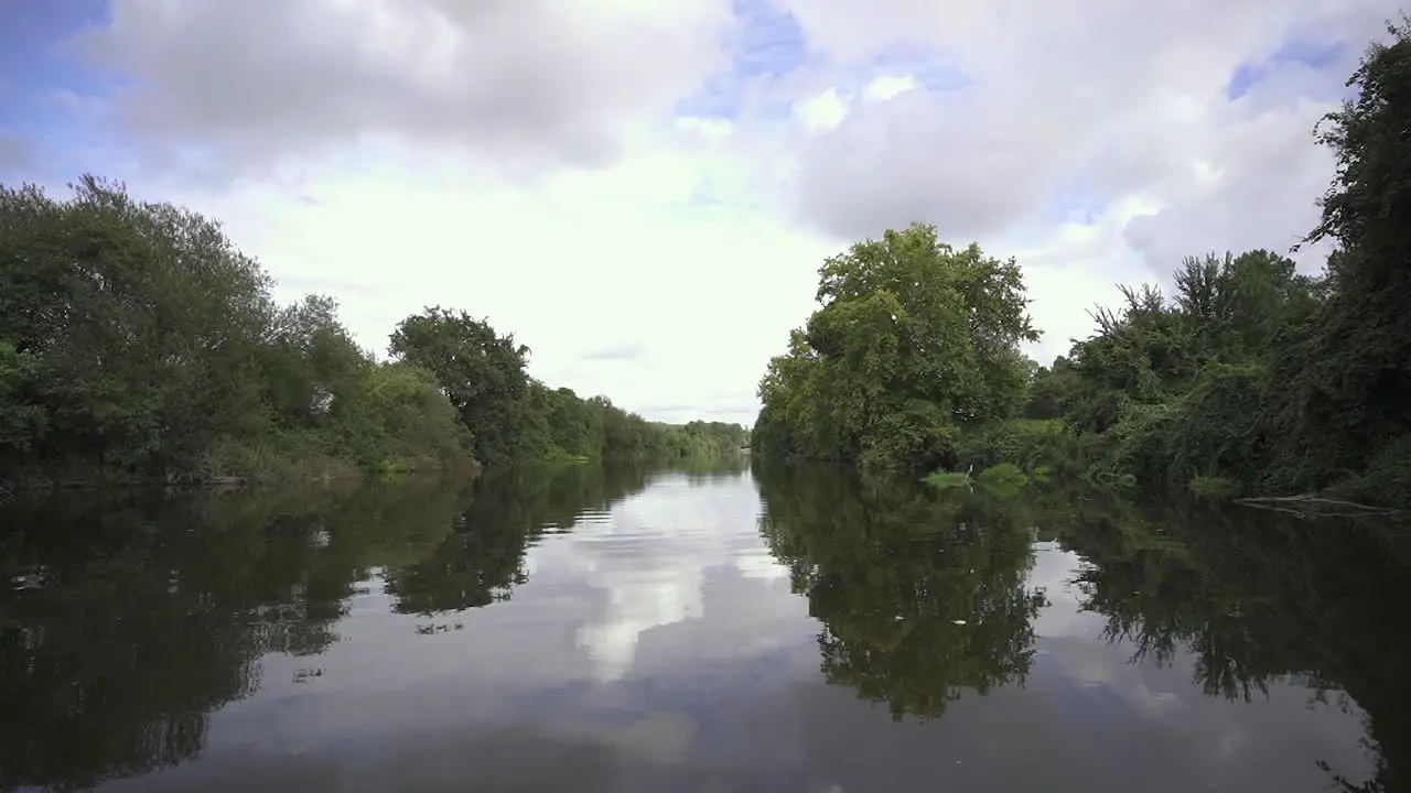 Traveling on the murky mangrove river water of Portugal Wide rolling