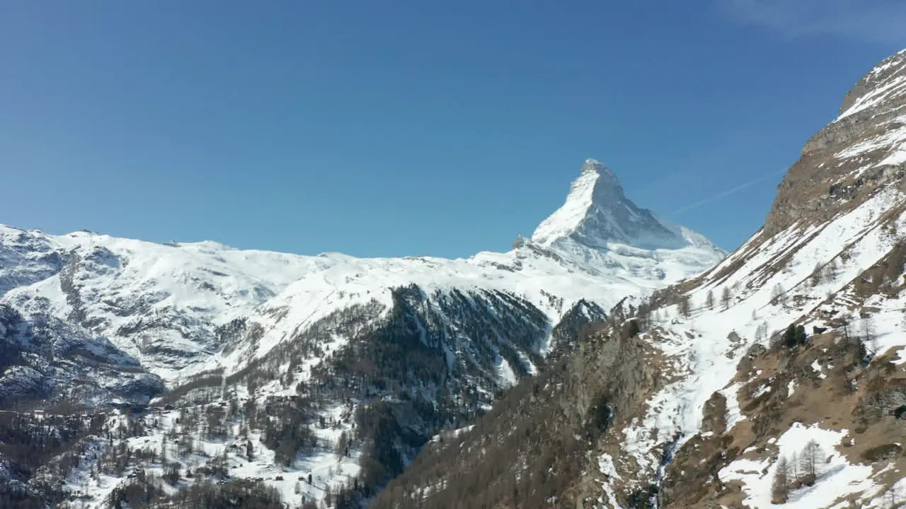 Aerial dolly of a distant Mount Matterhorn