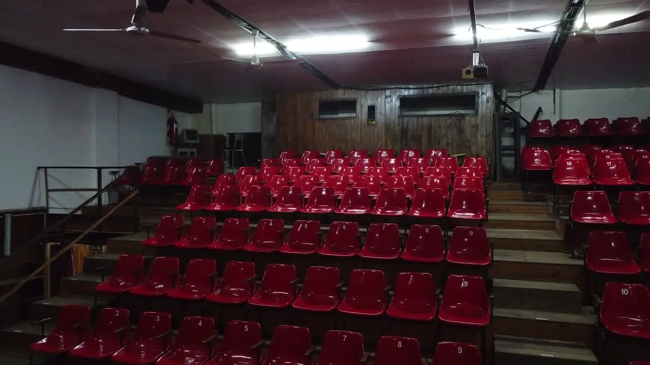 Empty theater hall red bleachers with no spectators