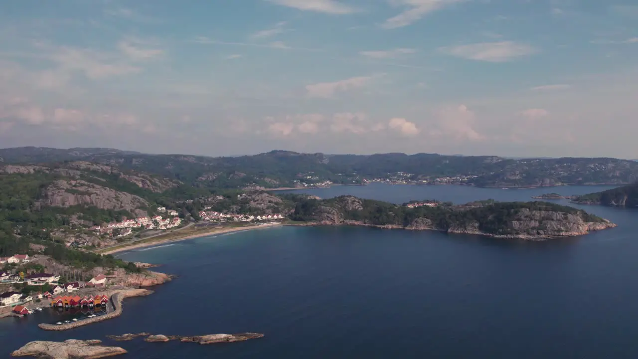 Drone shot of a beach and cabins in Spangereid Lindesnes South of Norway on a beautifull summer day