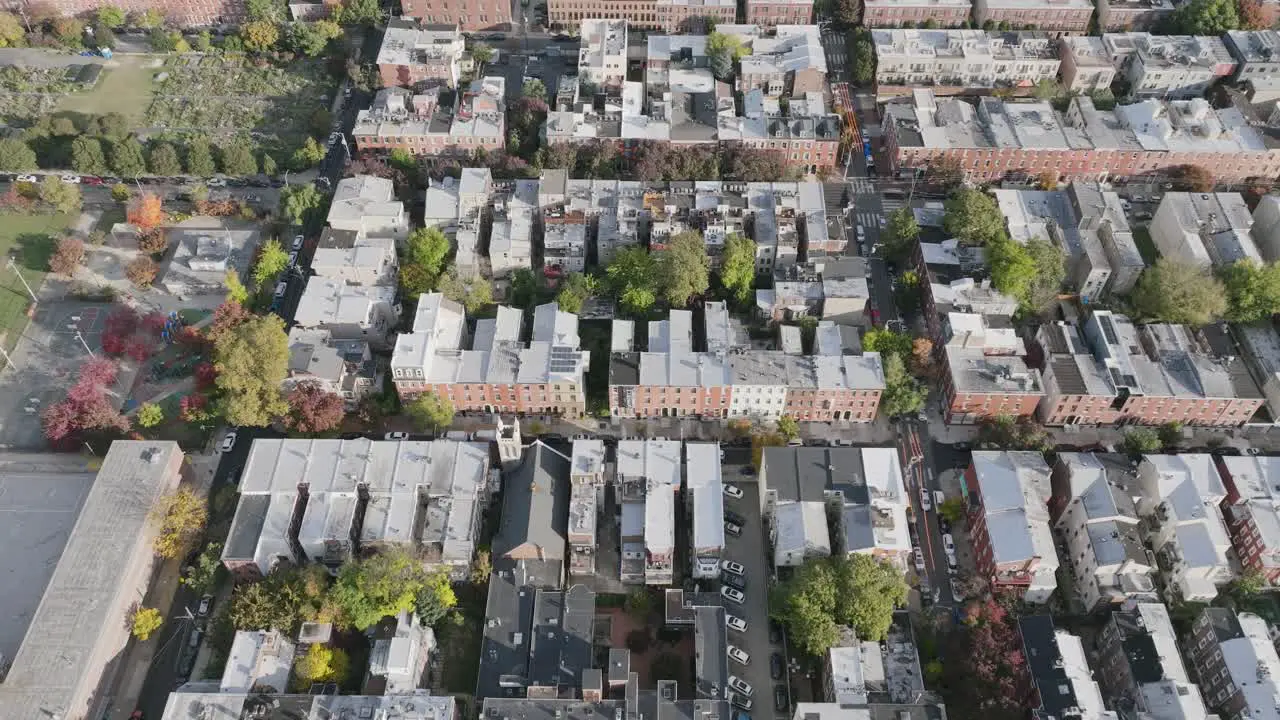 Aerial footage flyover of close housing and neighborhoods in north Philadelphia Pennsylvania