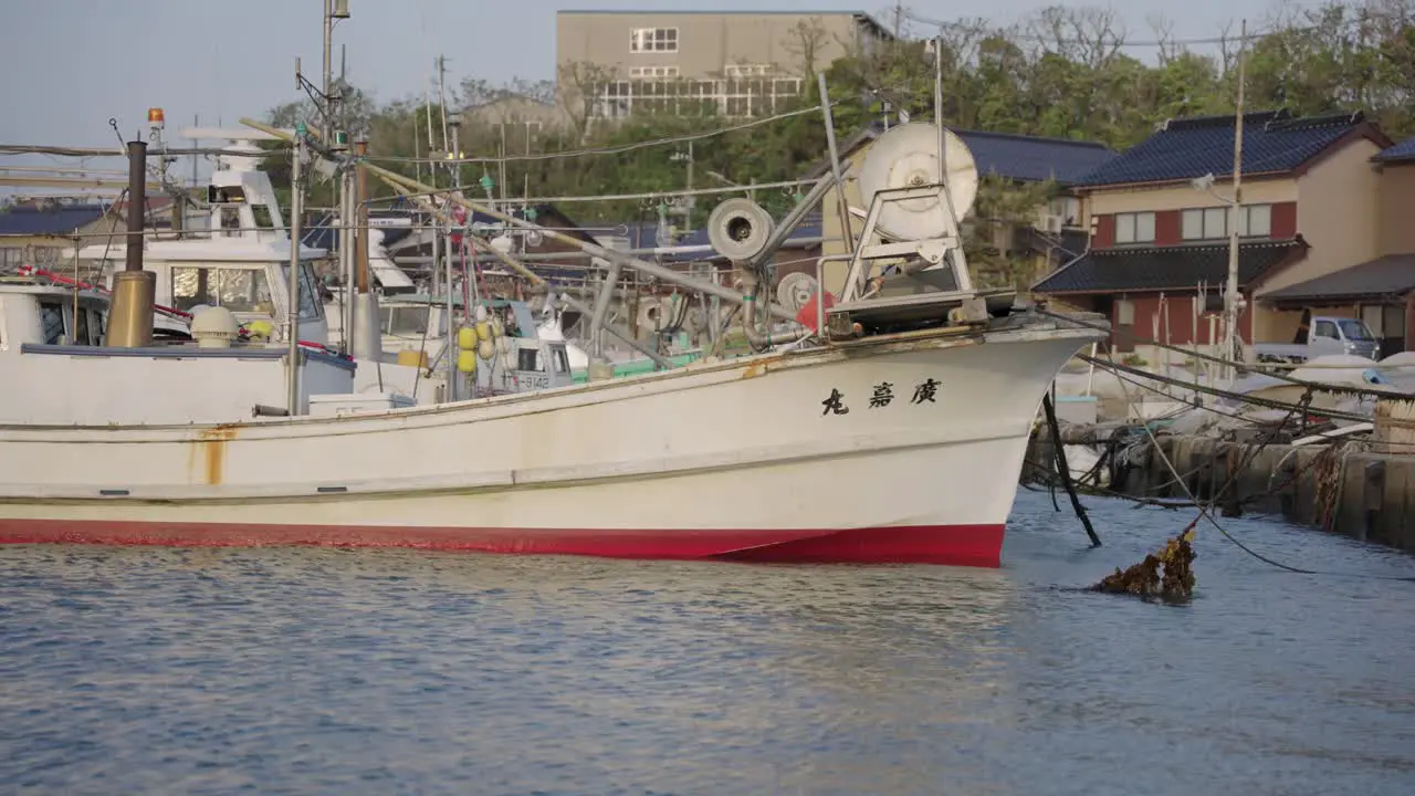 Fishing boats in harbor at small town of Mikuriya Tottori Japan