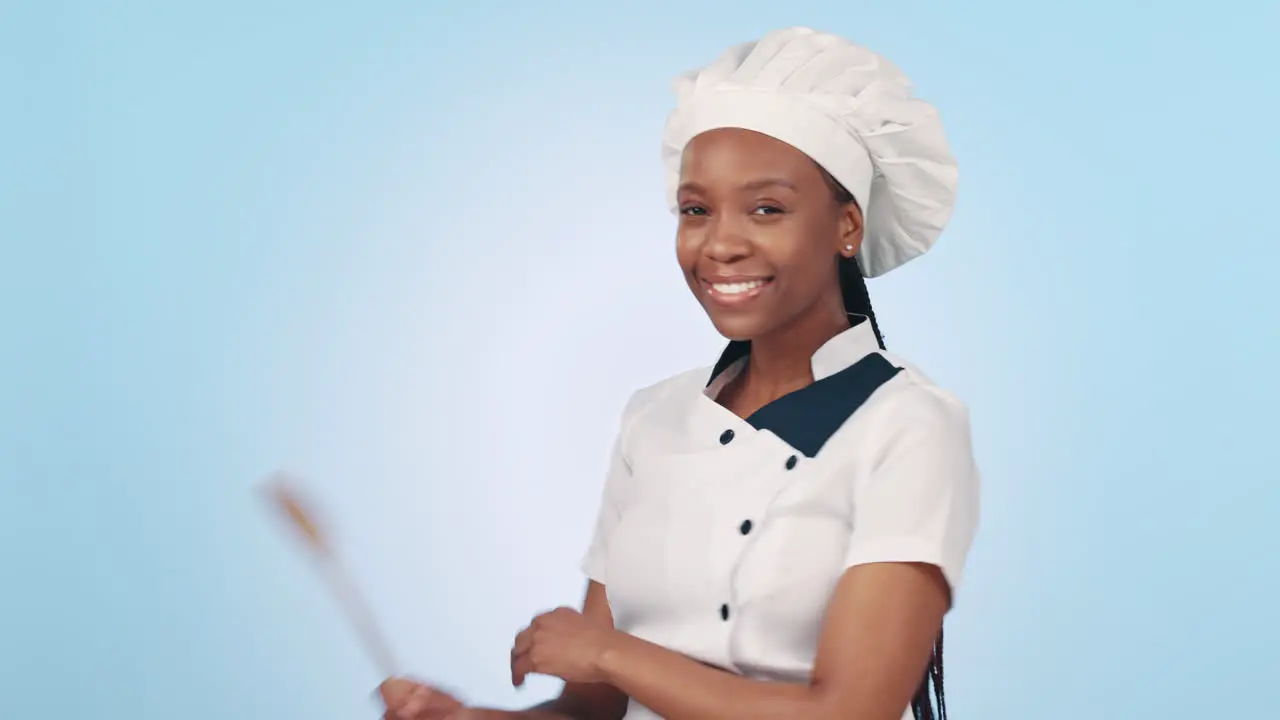 Studio chef arms crossed and happy black woman