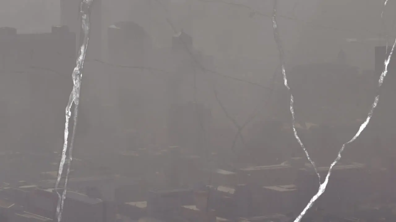 Animation of scratches changing over grey cityscape