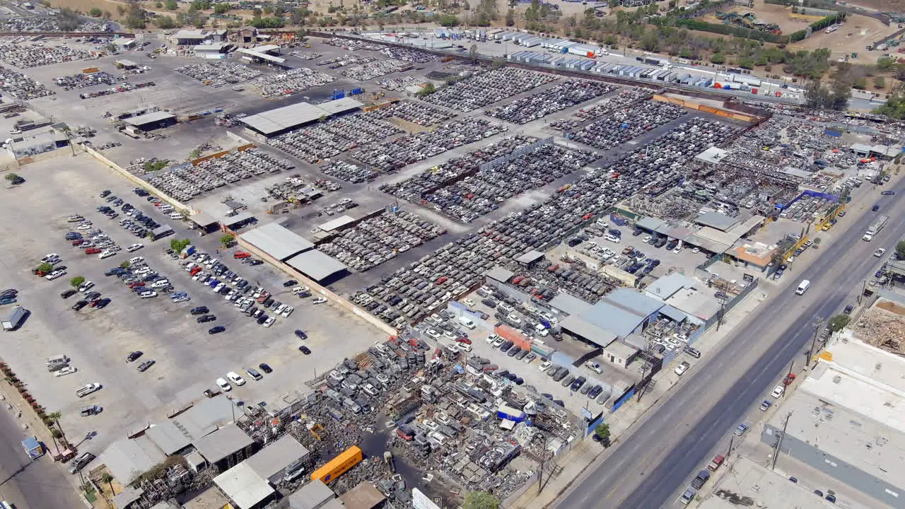 Large used broken car parking lot and car