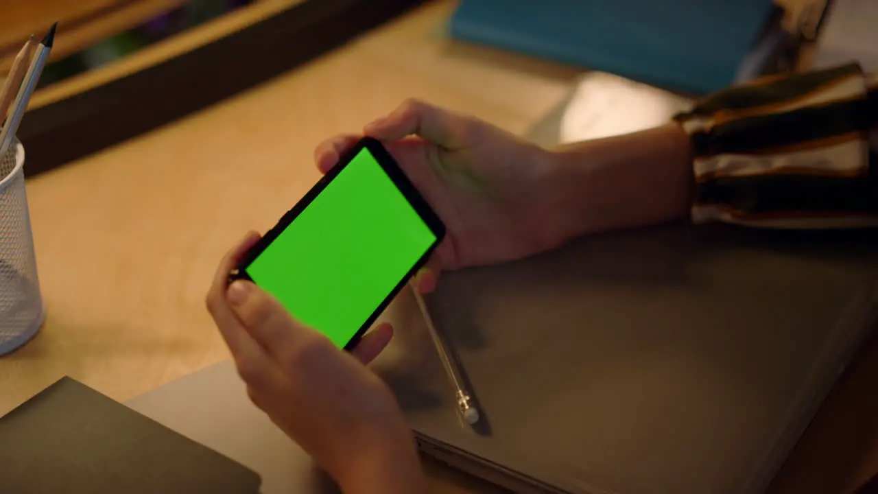 Woman watching video on smartphone