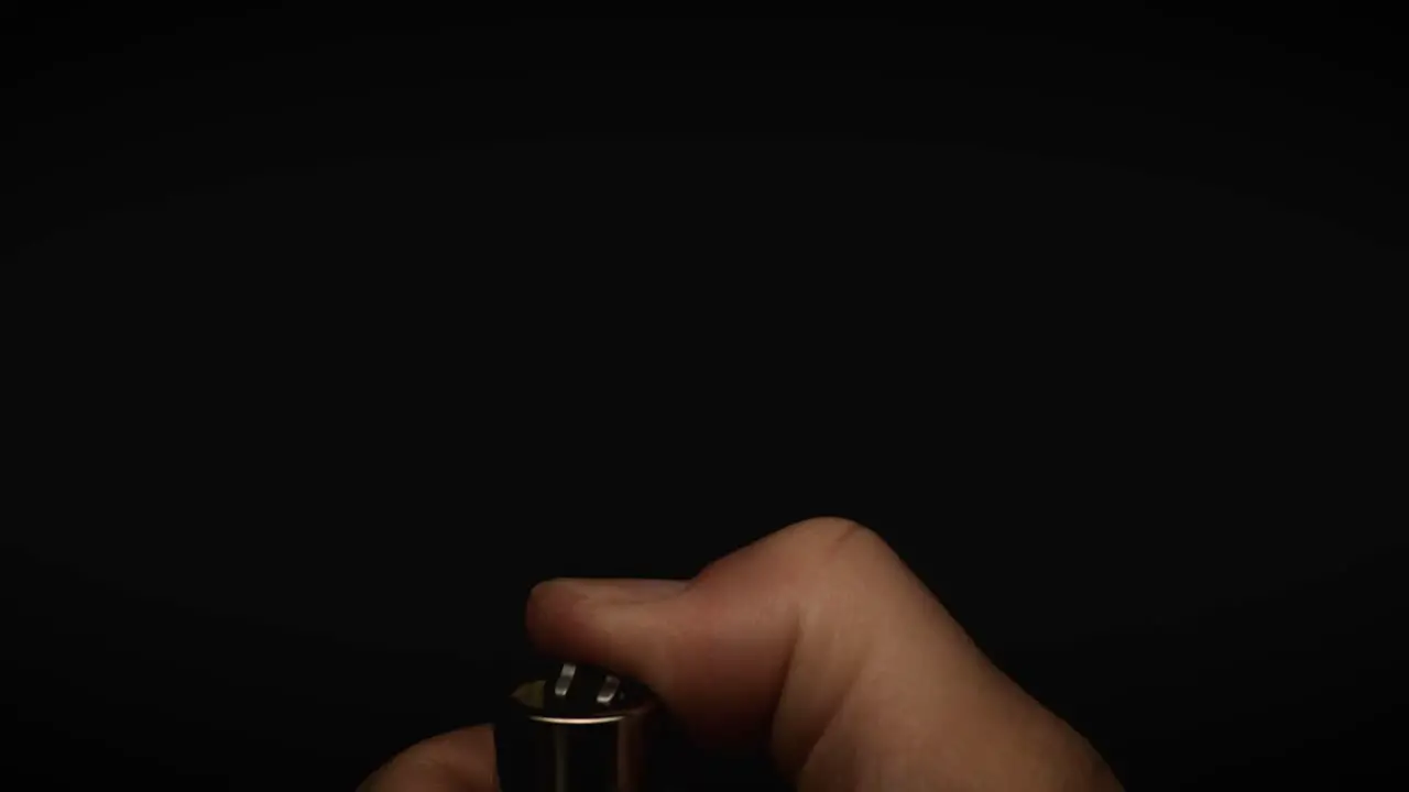 starting a flame with a lighter in super slow motion 800fps