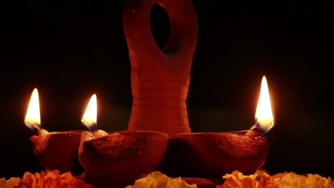 Close up of beautifully lit mud lamps for a festive celebration