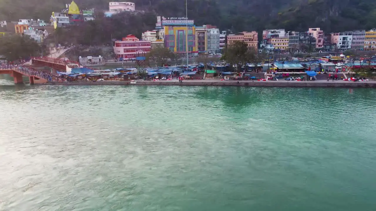 city building wide view situated at holy ganges riverbank at evening aerial video is taken at har ki pauri haridwar uttrakhand india on Mar 15 2022