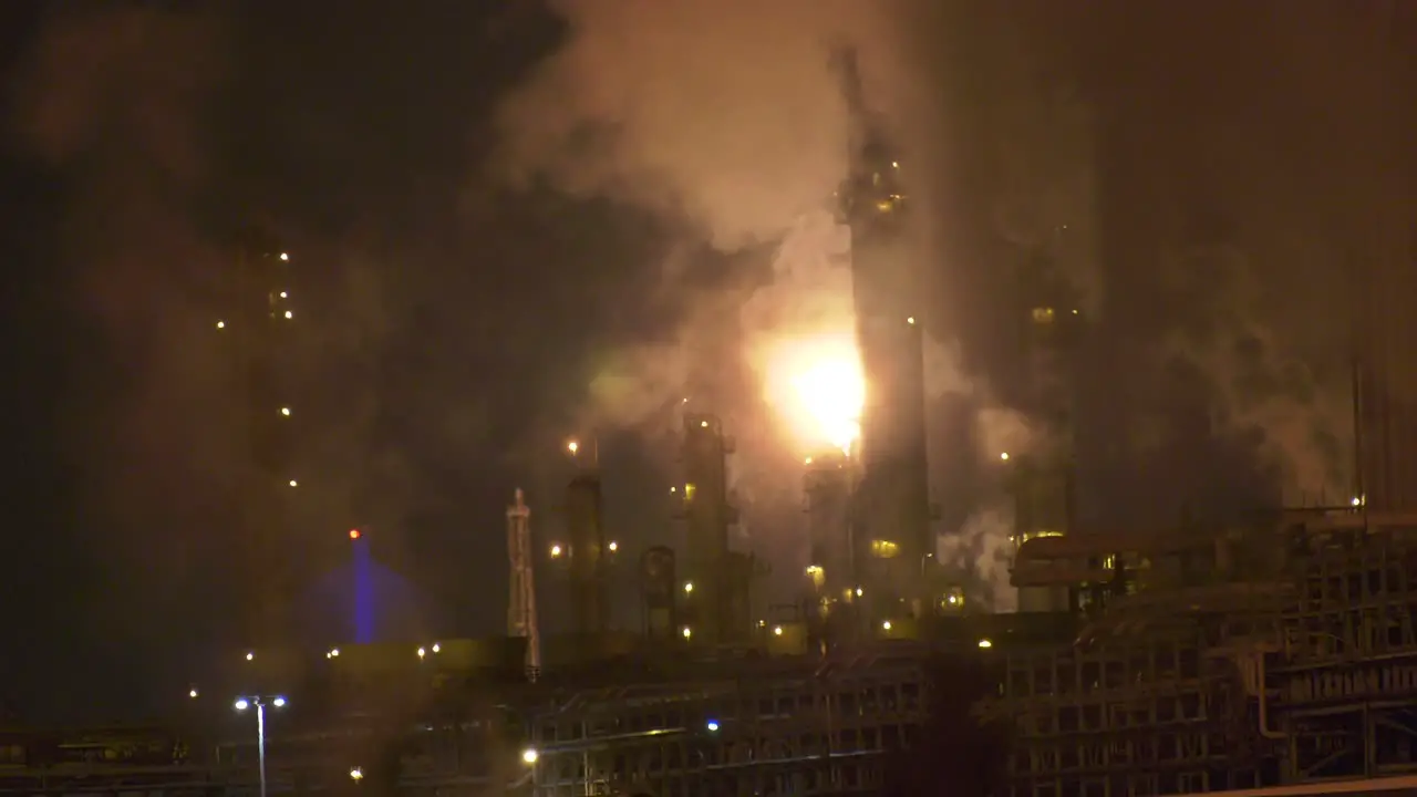 Oil Refinery towers flaring off