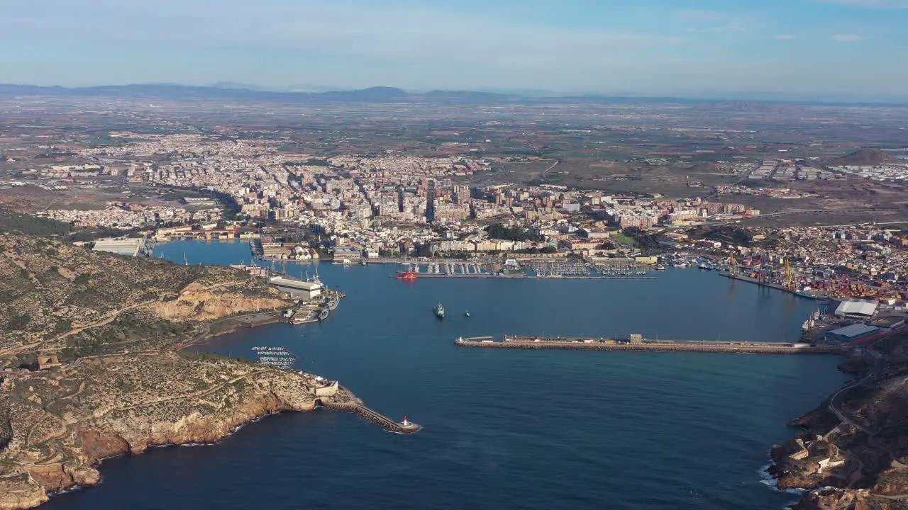 Aerial view of Cartagena port sunny day Spain major naval station Murcia