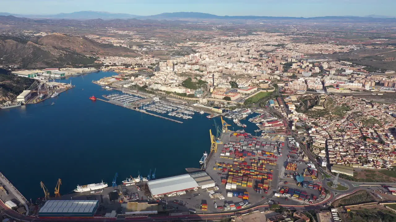 Commercial harbour and the city of Cartagena Spain sunny day aerial view