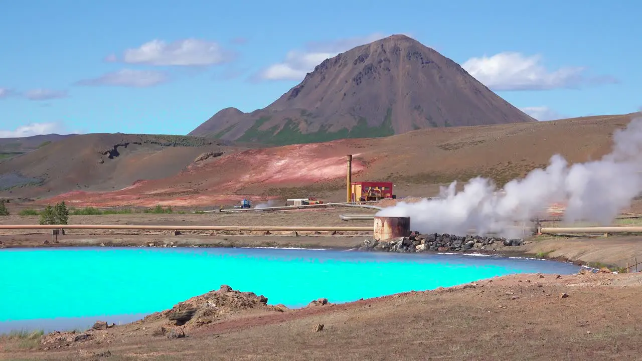 Vivid volcanic blue water behind the active volcano of Krafla in Myvatn Iceland