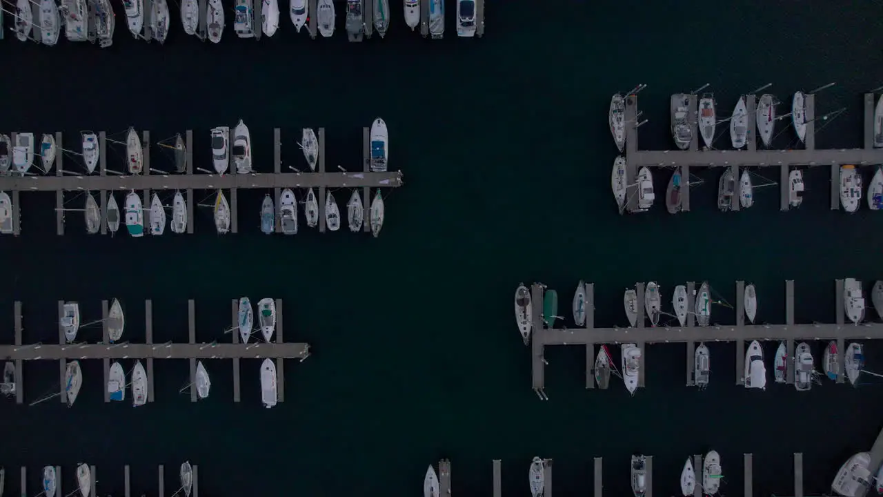 Downward aerial drone flyover of Seward Boat Harbor in Seward Alaska