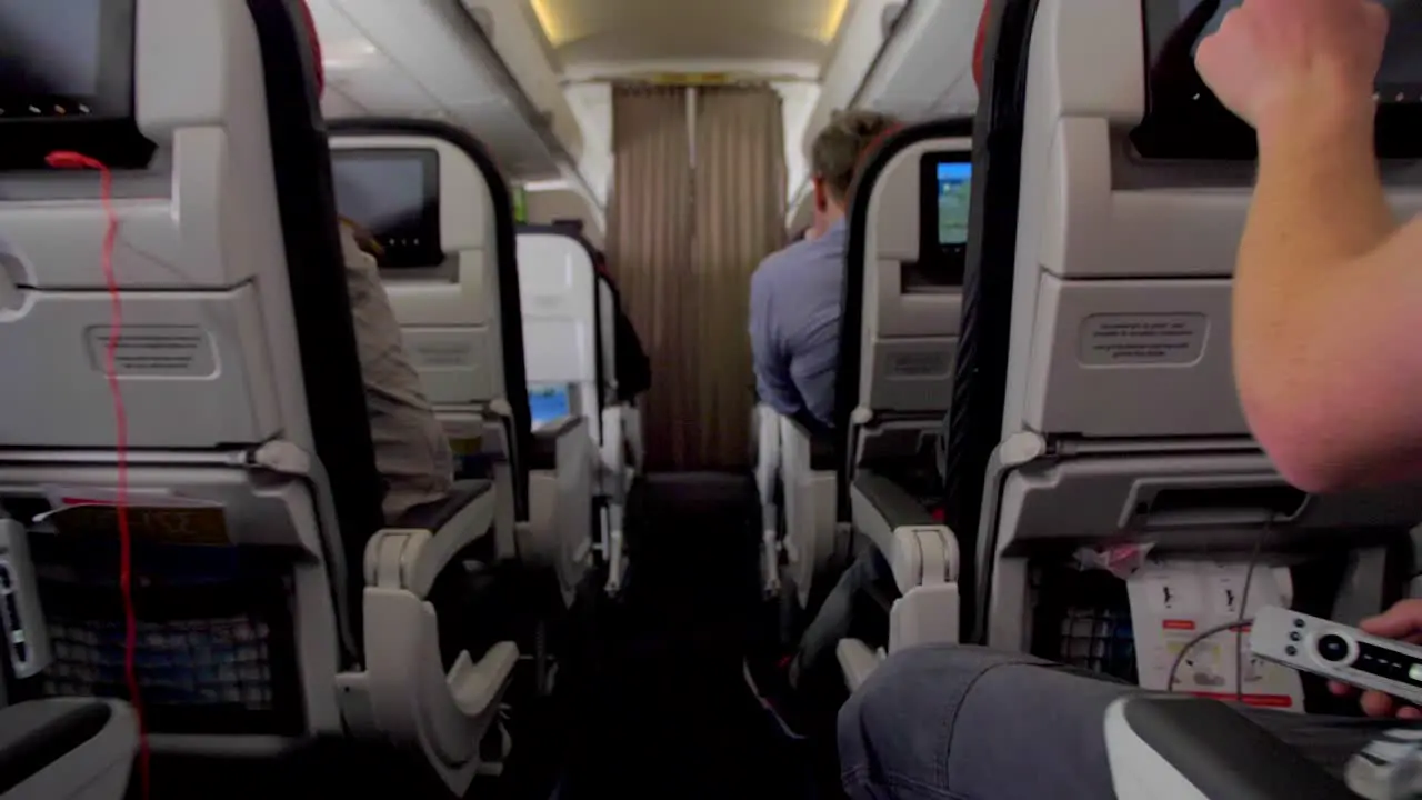 4k airplane passenger cabin gimbal shot airport departures terminal airport airline Flight Passengers