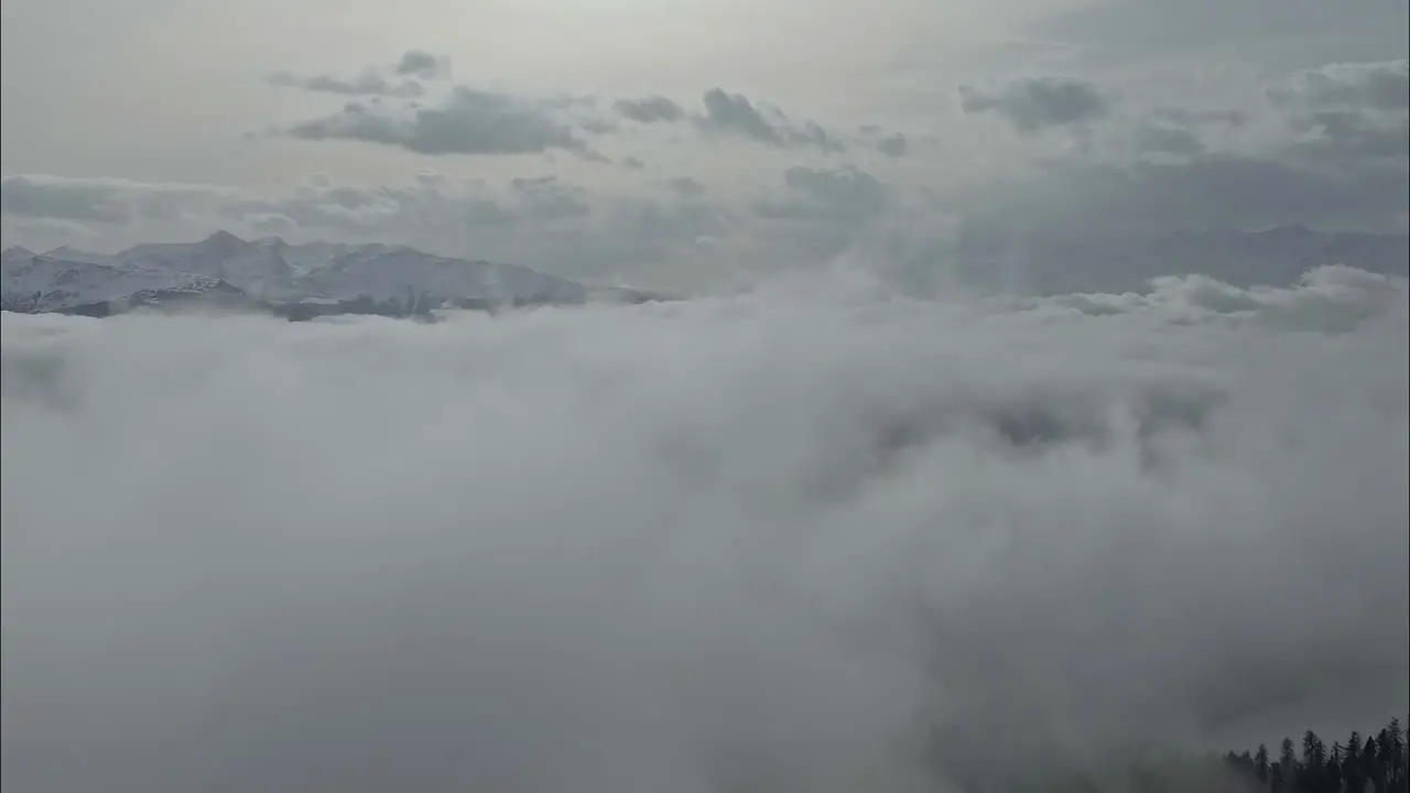 Aerial View Above Clouds with Dramatic Cloud Cover