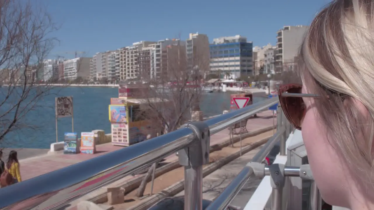 Over the shoulder shot of the baywalk in Sliema Malta circa Marc 2019