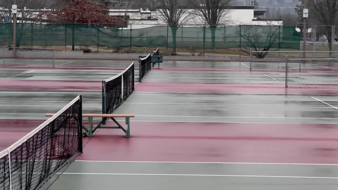 Wet tennis courts on a rainy day in Ashland Oregon