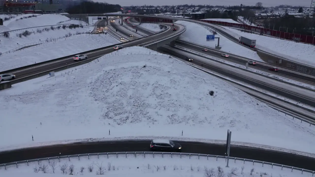 Snowy Autobahn interchange A40 Bochum Wide angle view dusk