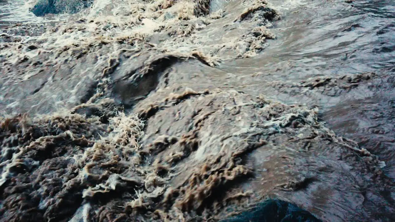 Dirty river with muddy water in flooding period during heavy rains