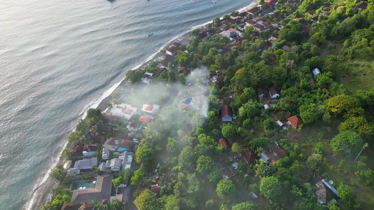 Bali Sun And Smoke During Morning Sunrise Amed Beach