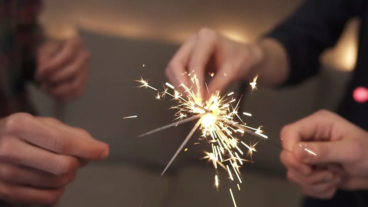 Footage Of Male And Female Hands Trying To Fire Up Bengal Lights Standing Around Making Circle