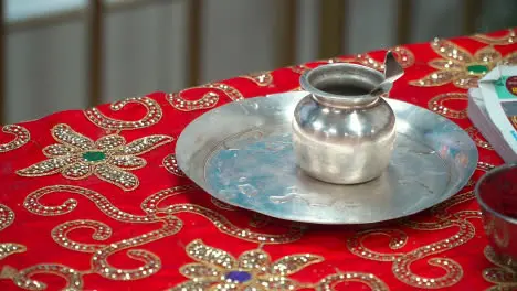 Close Up Of Amrit With Holy Water At Hindu Temple