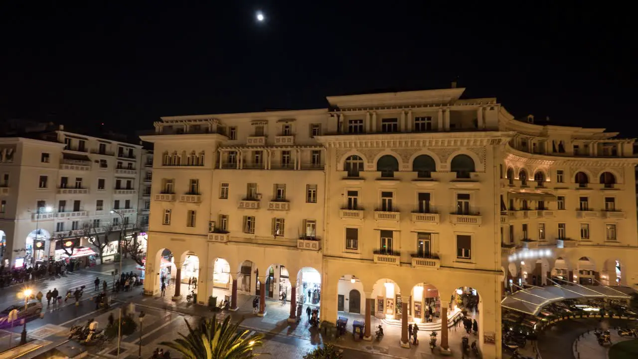 Timelapse in Thessaloniki Greece seen panorama of evening city with architectural buildings shops and area