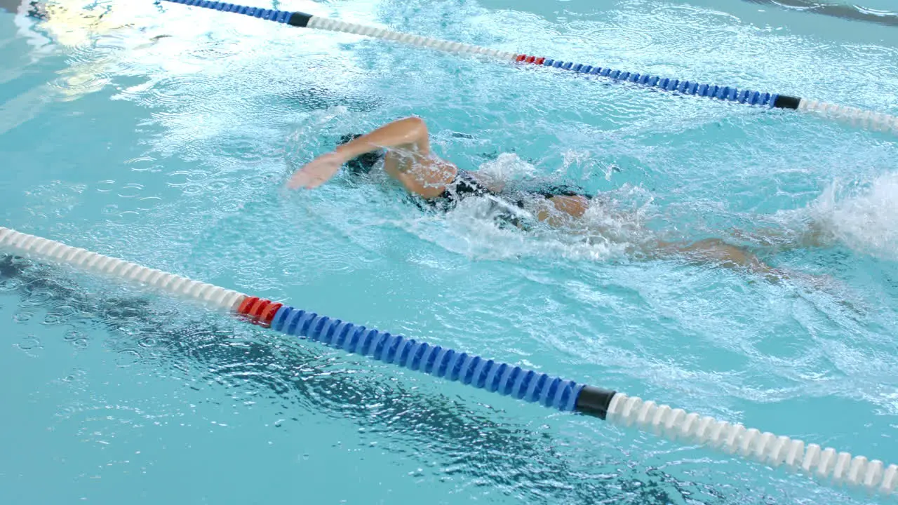 Swimmer in action at a pool competition