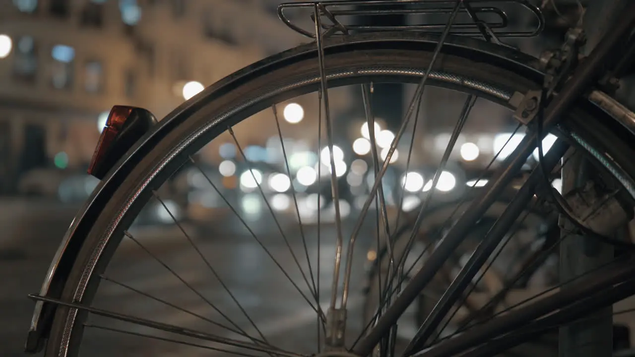 Car traffic and bicycle in night city