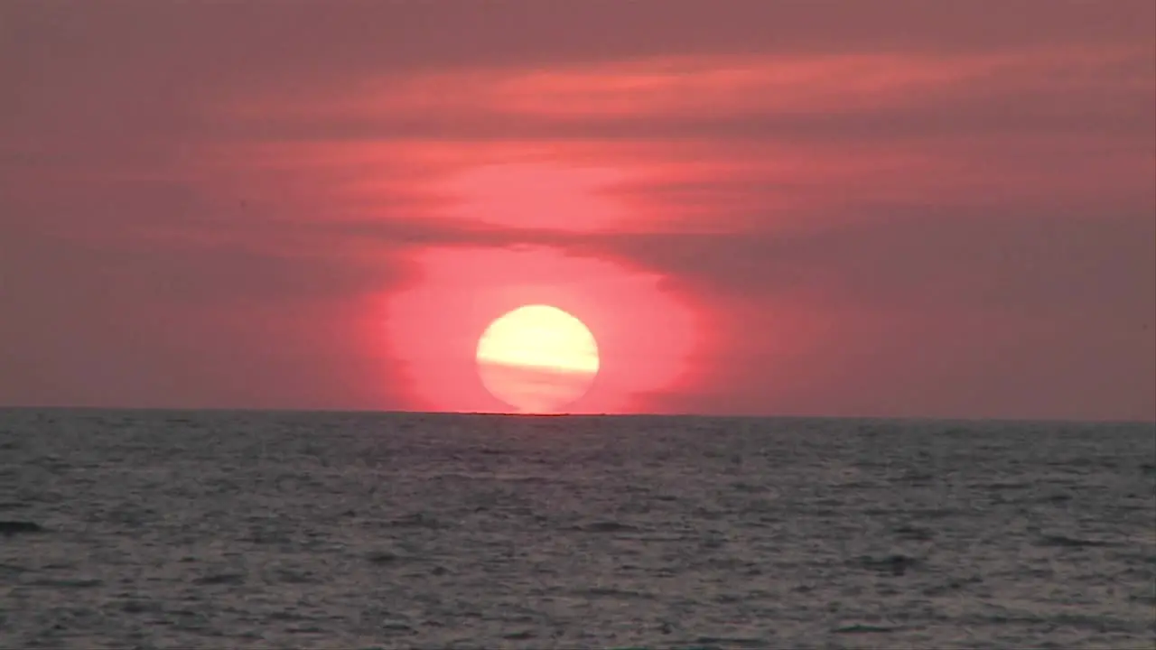 Sun sets in the distance in Puerto Vallarta Mexico at a beach resort