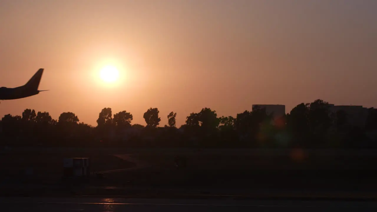 Plan landing in a beautiful California sunset