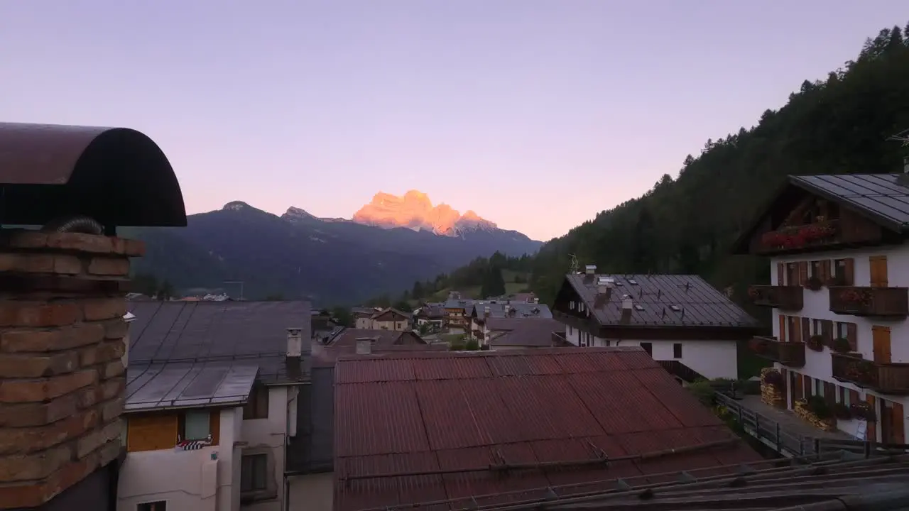 Orange foggy sunrise timelapse in rock mountains