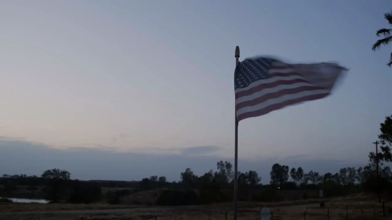 Sunset in a farm display with old american flag pan and hero shoot