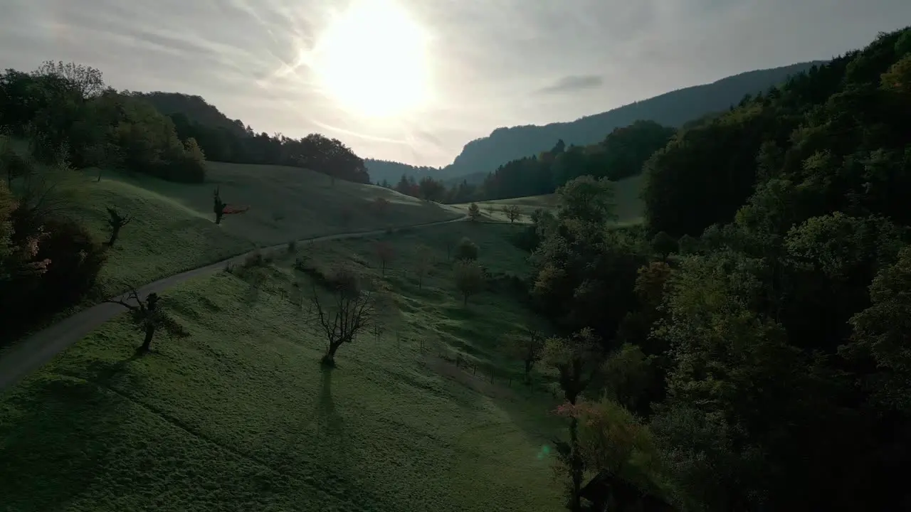 Drone flight over a field in switzerland in