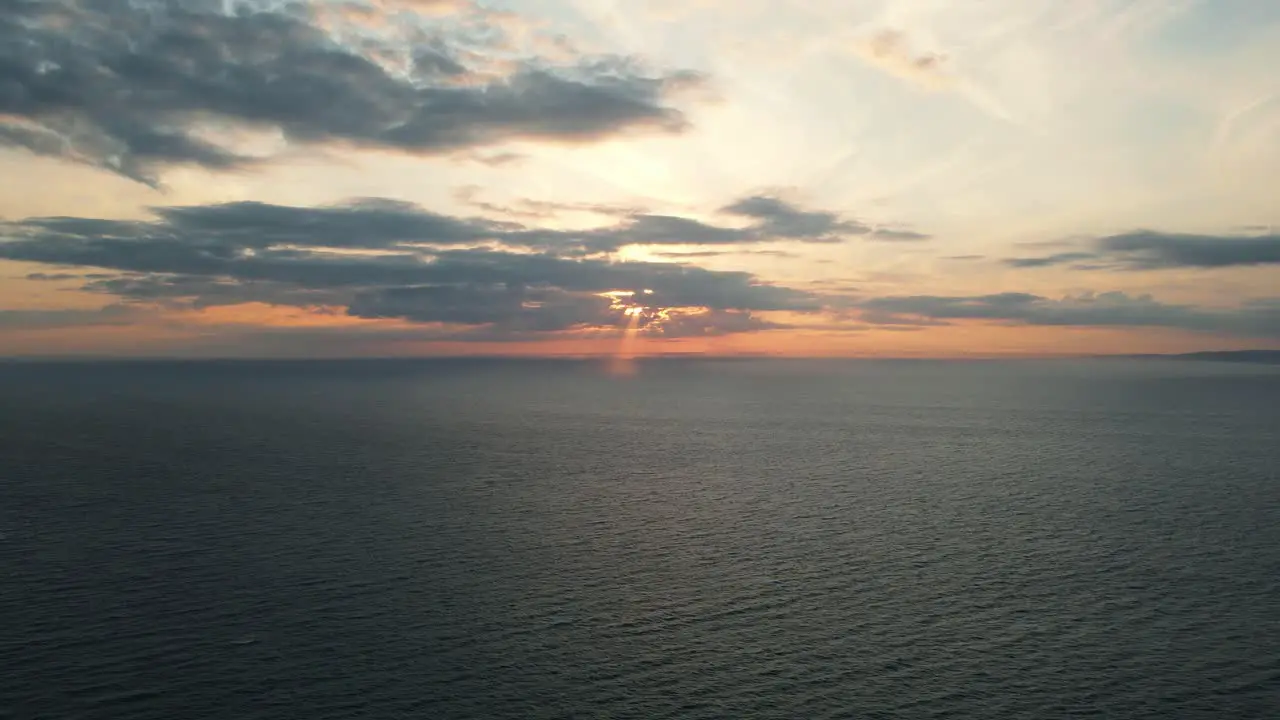 Drone shot of an amazing sunset over the English ocean