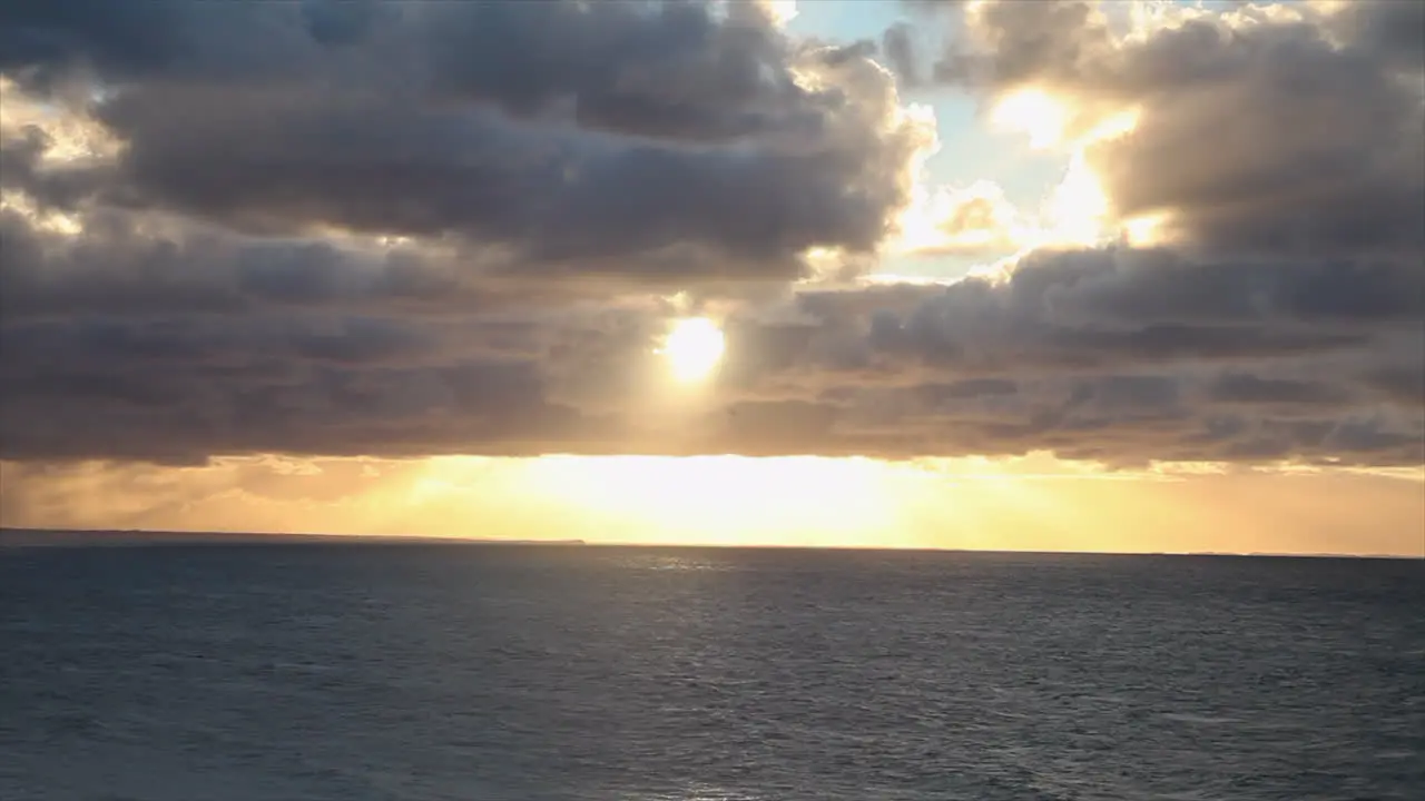 Golden cloudy sunset over the ocean in Australia