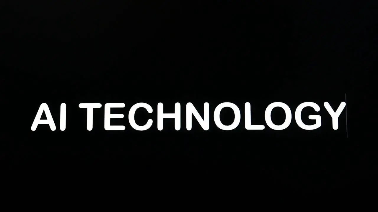 Writing on the screen with a flashing paragraph forming the word ai technology in white on a black background