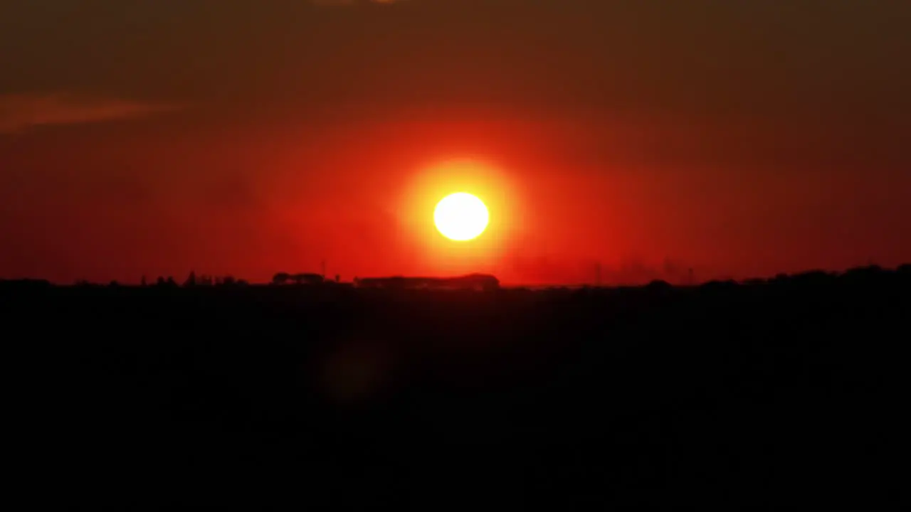 Spectacular sunset drone footage with vivid sun