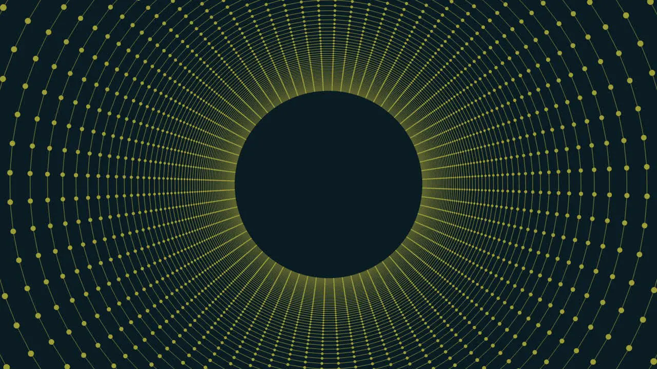 Symmetrical circular pattern of yellow dots on black background