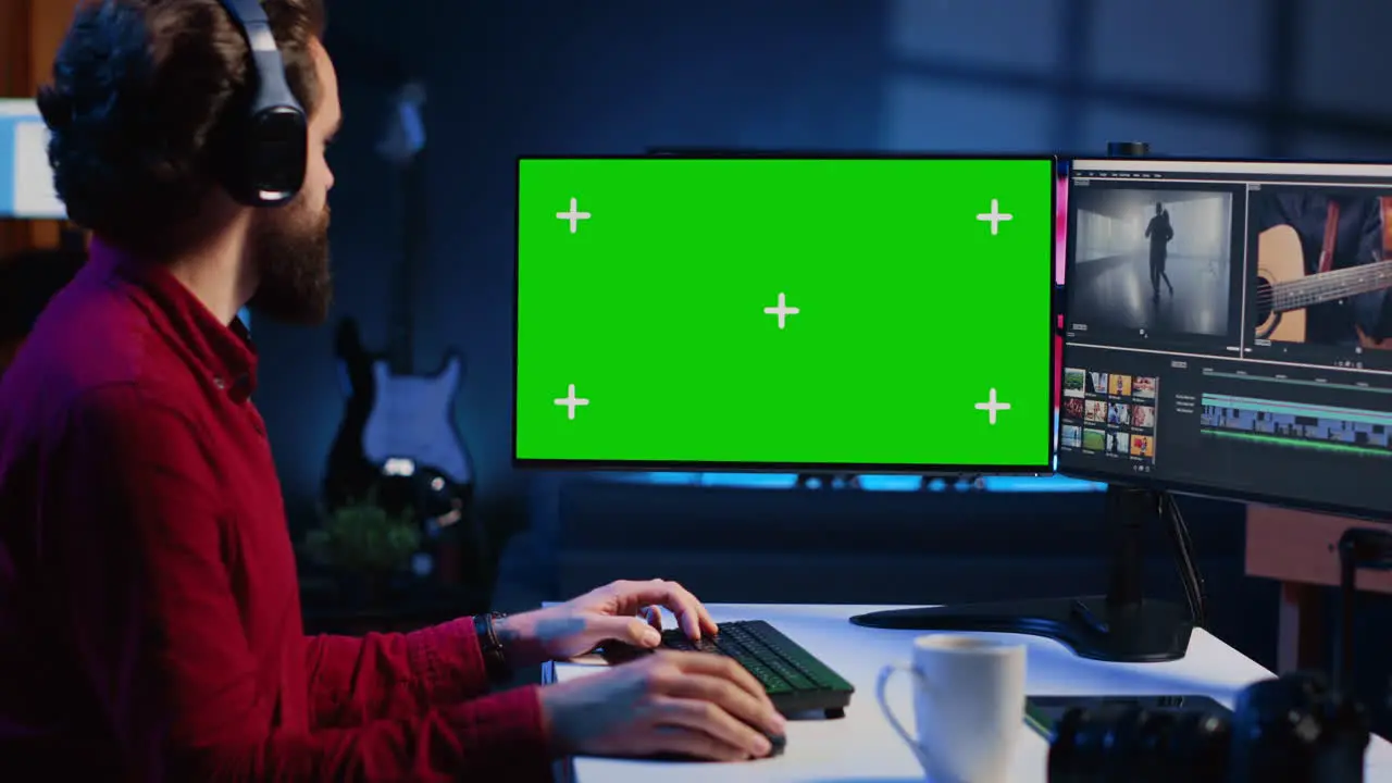 Expert using post production techniques to edit raw clips footage on isolated screen monitor